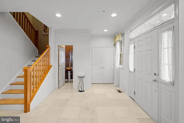 a bathroom with a granite countertop sink and a granite