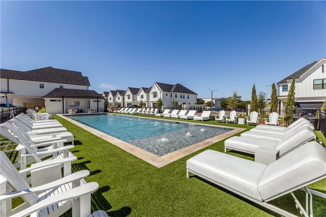 an outdoor sitting area with a table