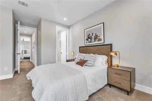 a bed room with a bed and a couch