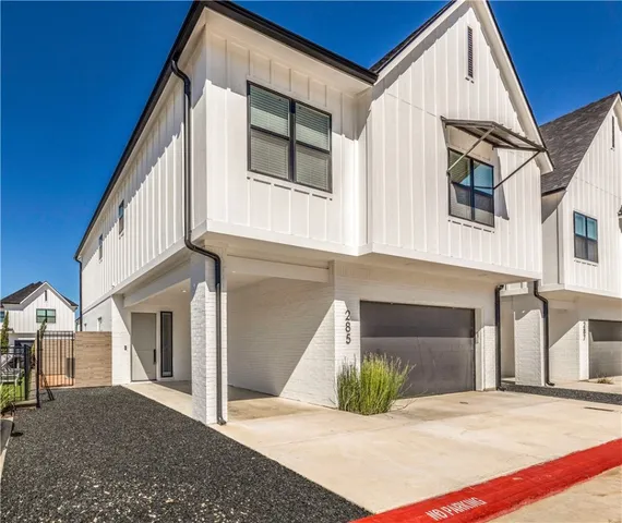 a view of a house with a street