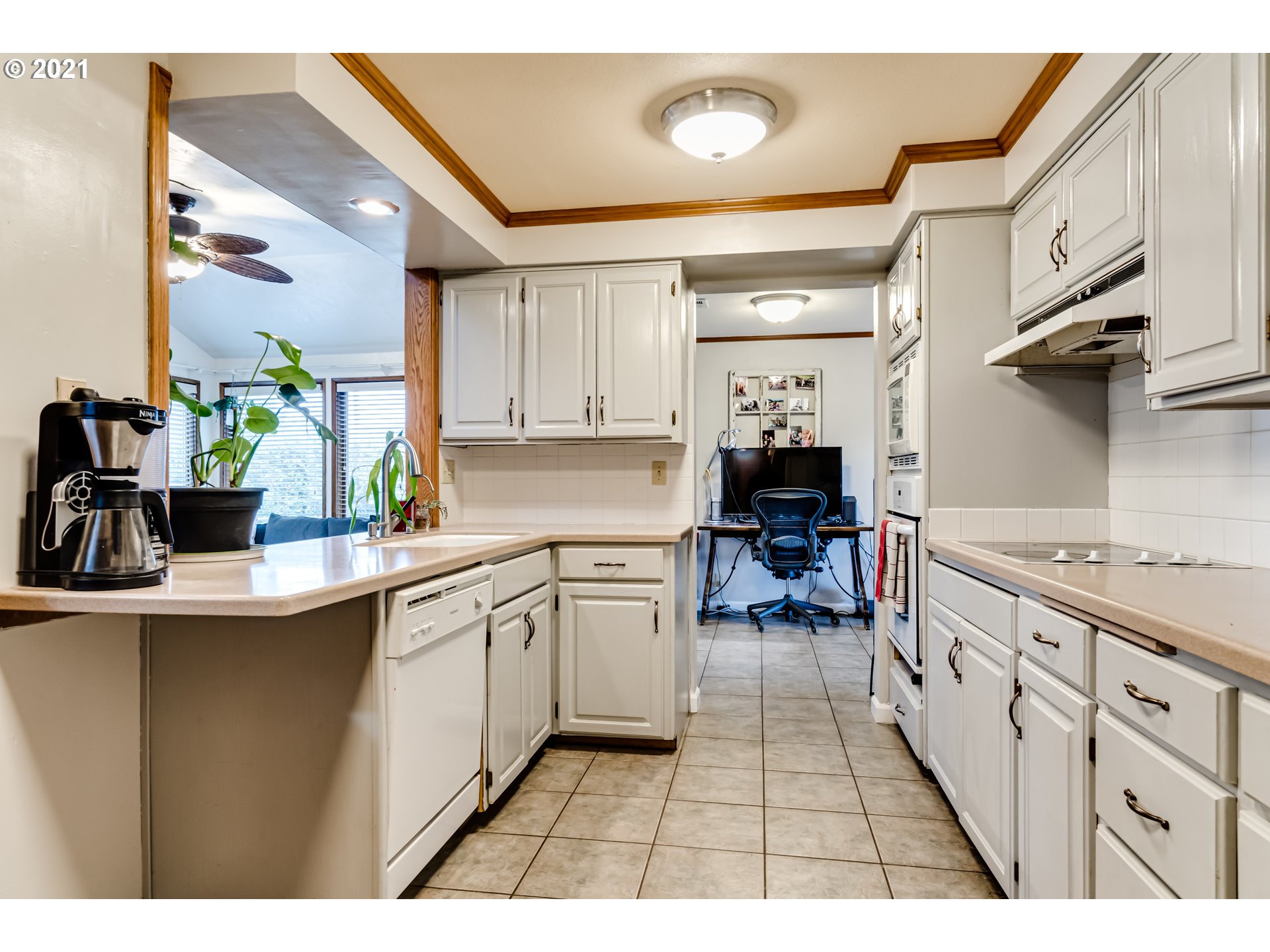 3324 Montebello Avenue Springfield, OR 97477 - Photo 7 of 32 a kitchen with a sink cabinets and window
