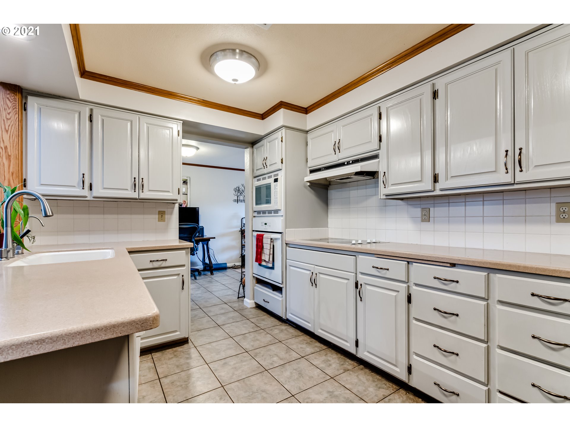 3324 Montebello Avenue Springfield, OR 97477 - Photo 8 of 32 a kitchen with cabinets appliances and a sink