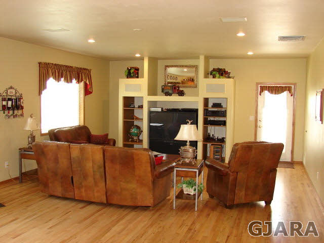 2524 I Road Grand Junction, CO 81505 - Photo 2 of 25 a living room with furniture and a wooden floor