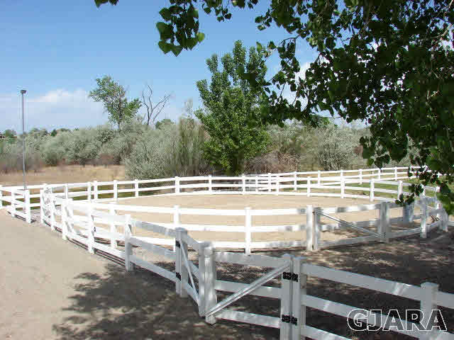 2524 I Road Grand Junction, CO 81505 - Photo 25 of 25 a view of a swimming pool with a lawn chairs
