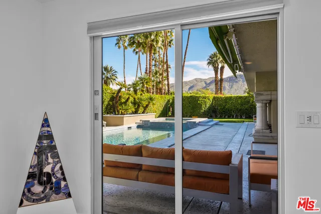 a bathroom with a tub and shower