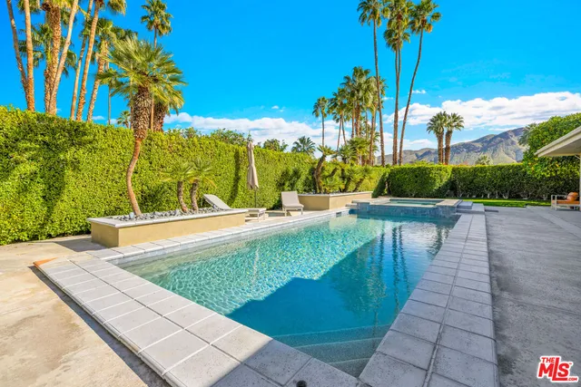 a view of a table and chairs in patio