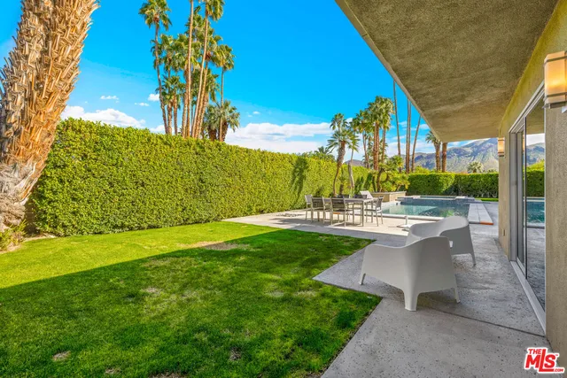 a view of a street with an ocean view