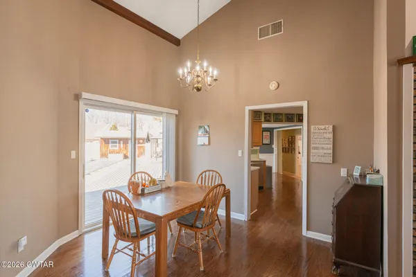 a view of an entryway with furniture and toys