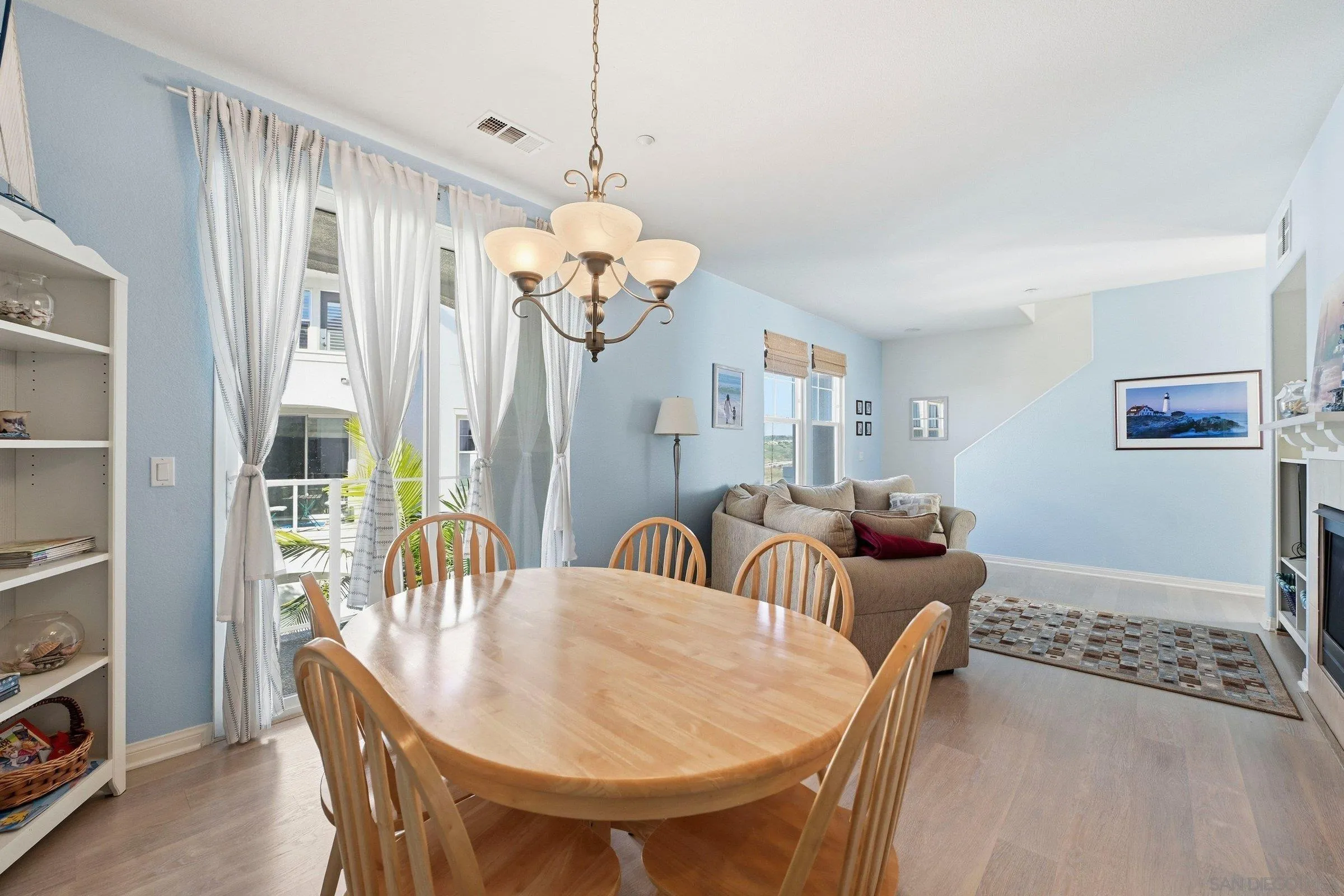 845 Harbor Cliff Way, Unit 305 Oceanside, CA 92054 - Photo 13 of 31 a view of a dining room with furniture