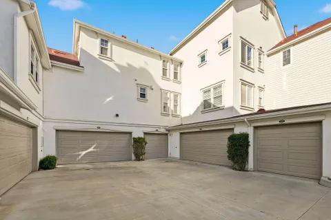 a view of a building with a garage