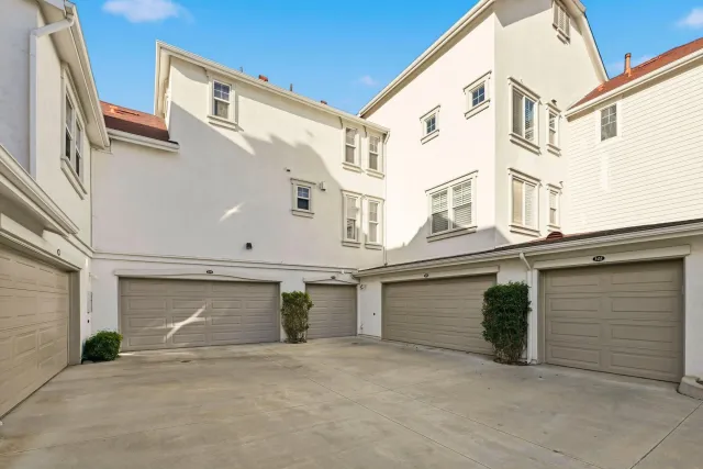 a view of a building with a garage