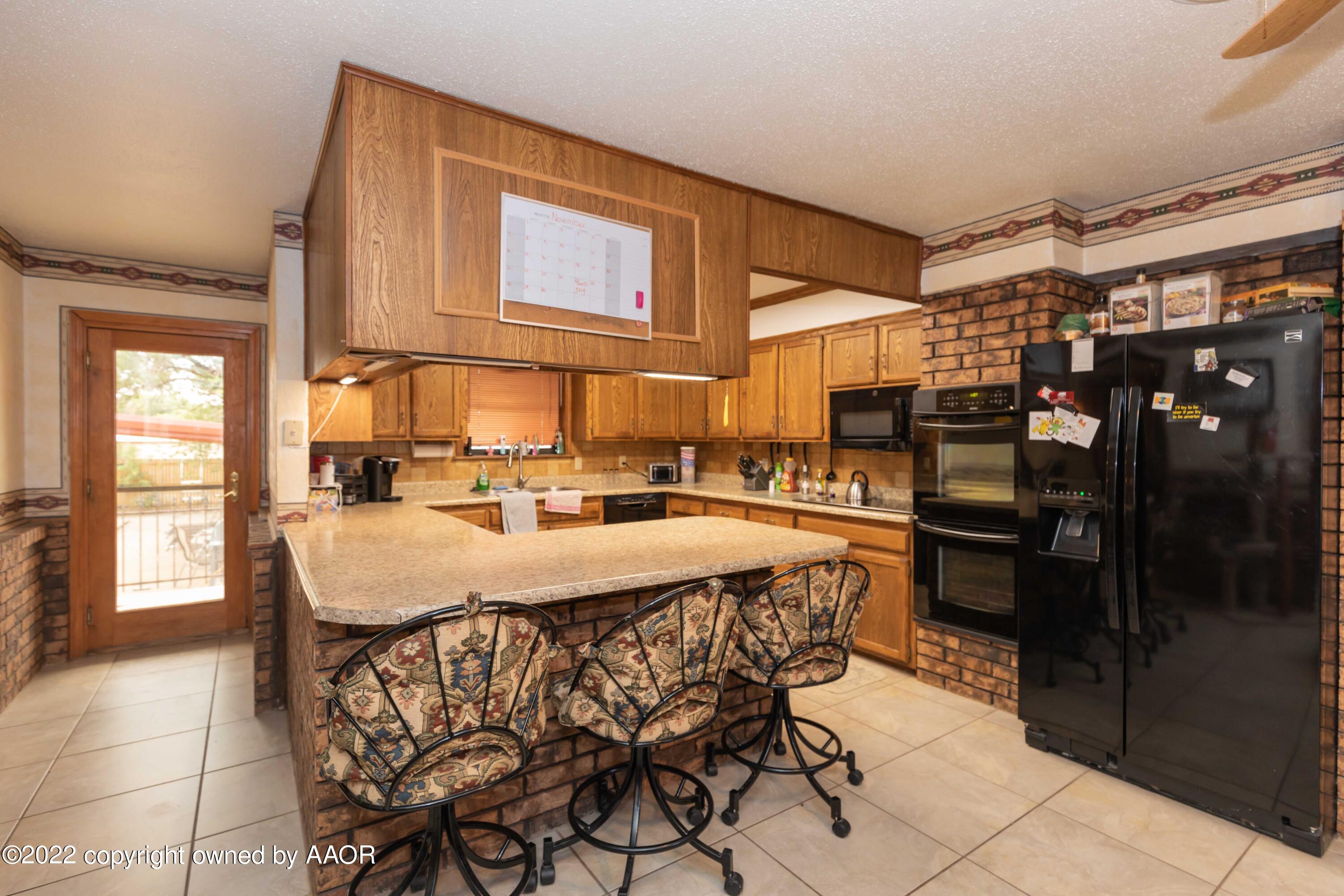 416 Caddo Road Amarillo, TX 79108 - Photo 7 of 62 KITCHEN VIEW 5