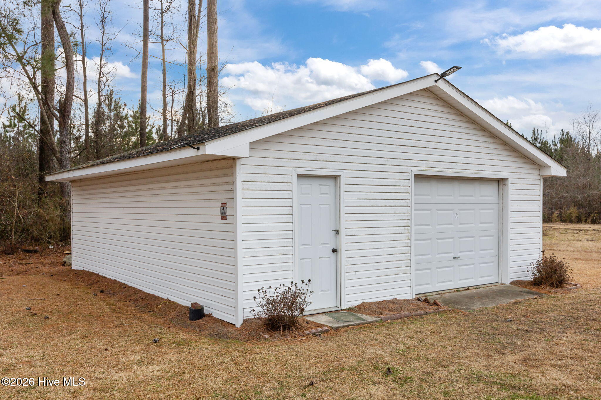 1101 Forlines Road Winterville, NC 28590 - Photo 6 of 52 nice detached workshop with roll up garage door