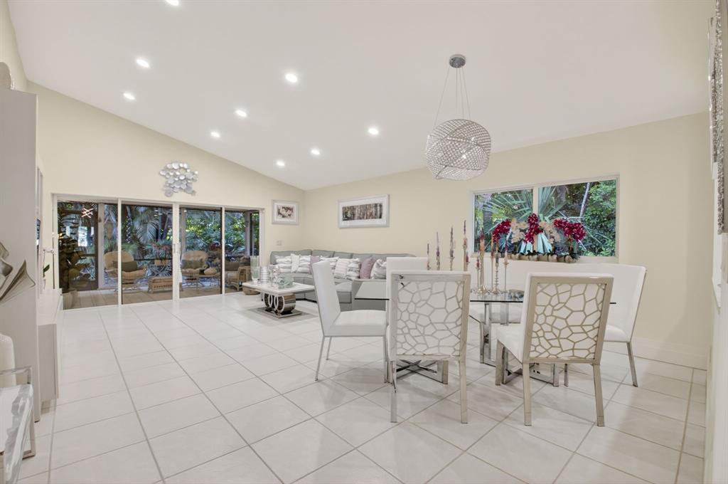 19452 Waters Reach Lane, Unit 305 Boca Raton, FL 33434 - Photo 12 of 77 a living room with furniture and a painting on the wall