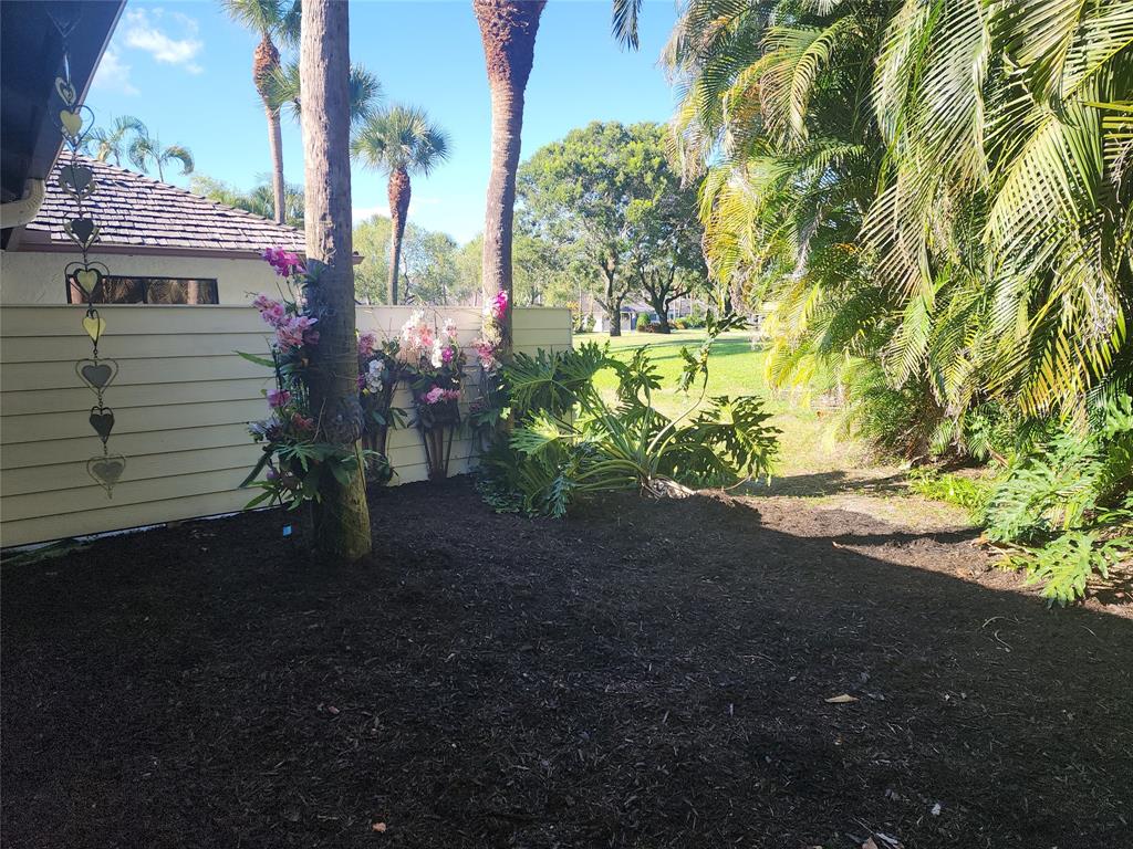 19452 Waters Reach Lane, Unit 305 Boca Raton, FL 33434 - Photo 31 of 77 a view of a house with a street