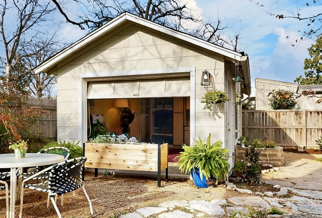 1906 Collier Street Austin, TX 78704 - Photo 34 of 40 A charming backyard retreat featuring a converted garage and inviting patio space.