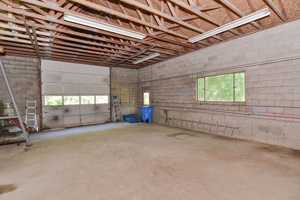 76 Brook Street Holliston, MA 01746 - Photo 11 of 31 a view of empty room with windows
