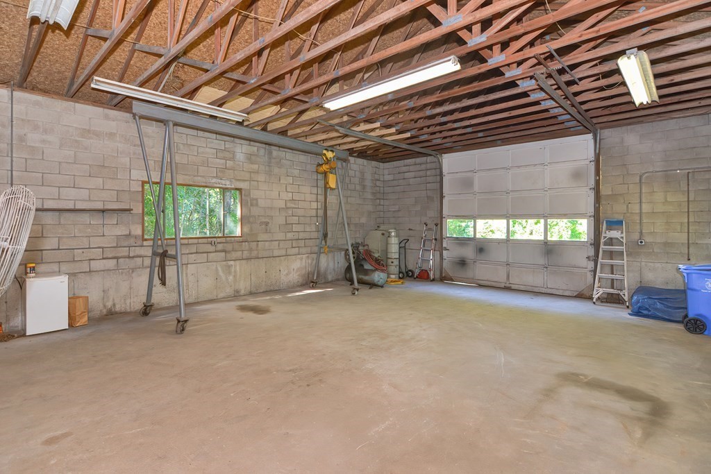 76 Brook Street Holliston, MA 01746 - Photo 12 of 31 a view of an empty room with windows
