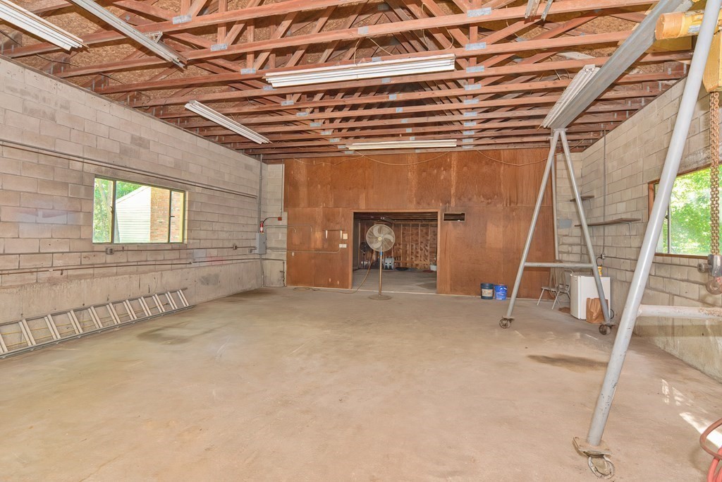 76 Brook Street Holliston, MA 01746 - Photo 14 of 31 a view of an empty room with a fireplace