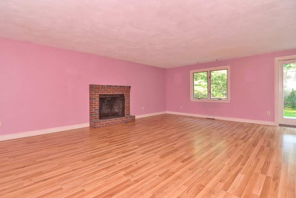 76 Brook Street Holliston, MA 01746 - Photo 21 of 31 an empty room with wooden floor and windows