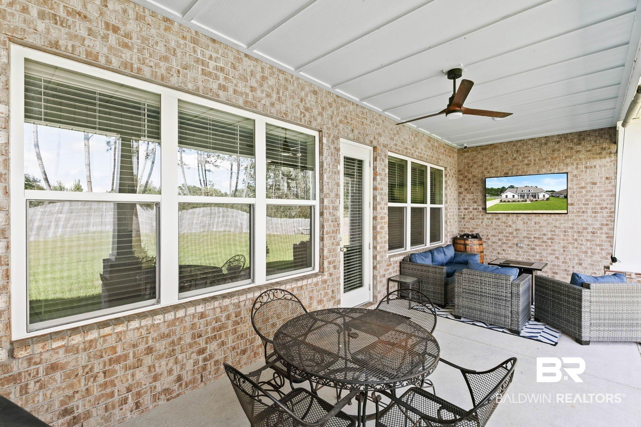 12785 Warbler Street Daphne, AL 36527 - Photo 39 of 53 View of patio featuring outdoor lounge area and a ceiling fan