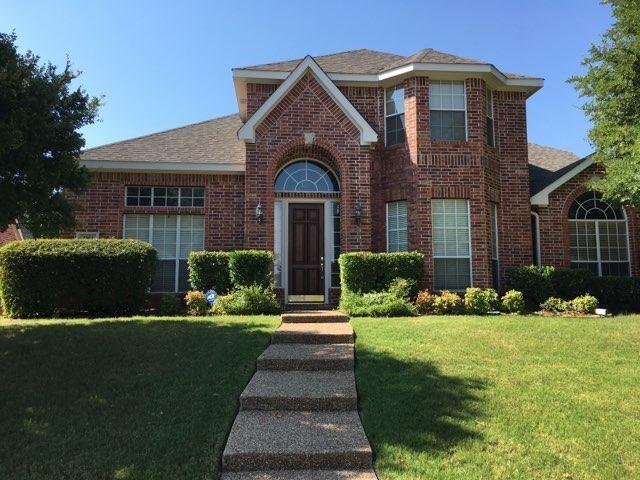 4804 Appleridge Drive Richardson, TX 75082 - Photo 1 of 1 a front view of a house with a yard