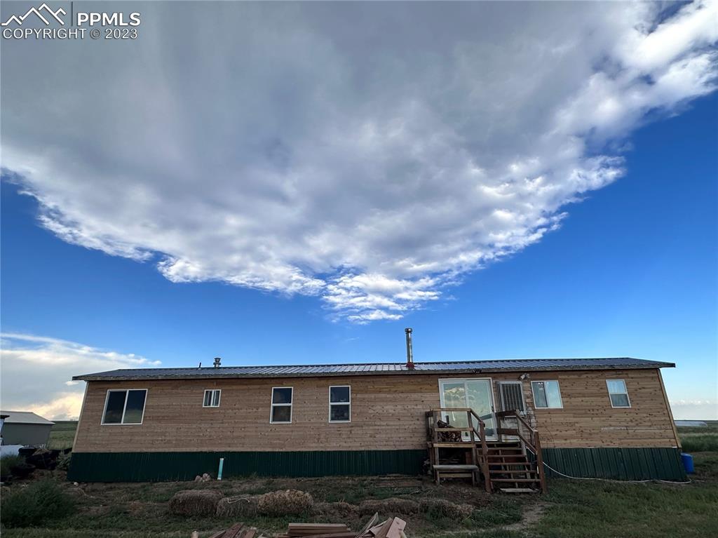 30595 Fred View Road Yoder, CO 80864 - Photo 1 of 21 a front view of a house