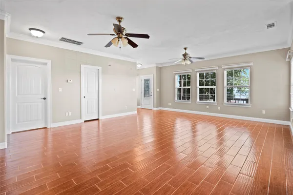 a kitchen with granite countertop a stove a sink and a granite counter top