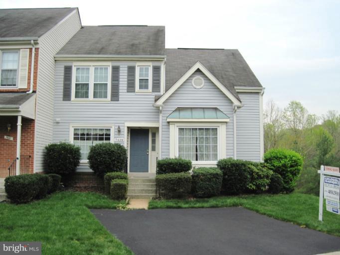 7439 Ridge Oak Court Springfield, VA 22153 - Photo 10 of 10 a view of a house with a yard and plants