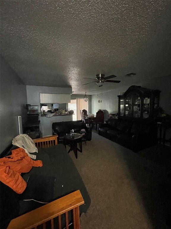 5227 Apala Drive Houston, TX 77032 - Photo 4 of 6 a living room with furniture and a kitchen area