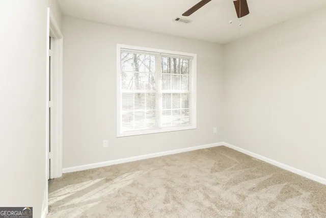 an empty room with windows