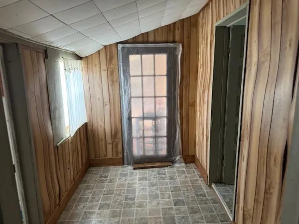 a view of empty room with windows