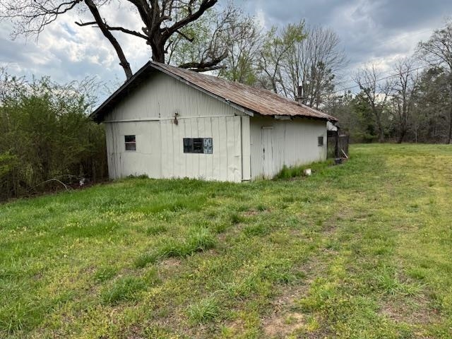 1040 Pocahontas Road Pocahontas, TN 38061 - Photo 4 of 14 a white house that has tree in front of it