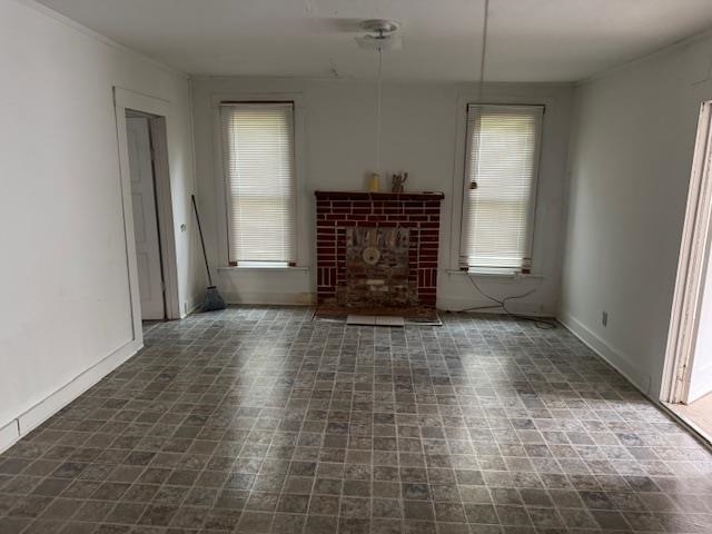1040 Pocahontas Road Pocahontas, TN 38061 - Photo 5 of 14 an empty room with fireplace and cabinet