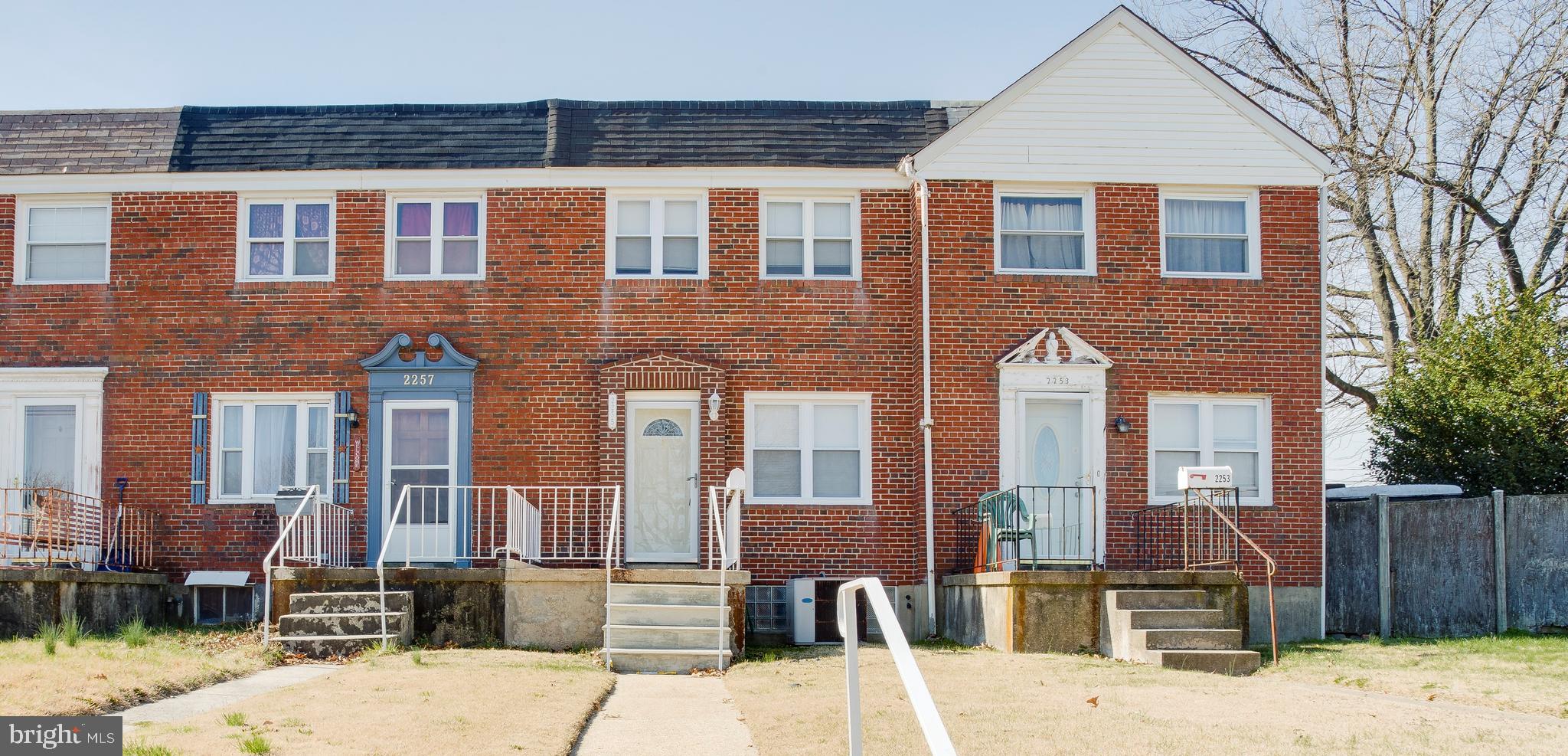 2255 Searles Road Baltimore, MD 21222 - Photo 1 of 13 a front view of a house with a yard