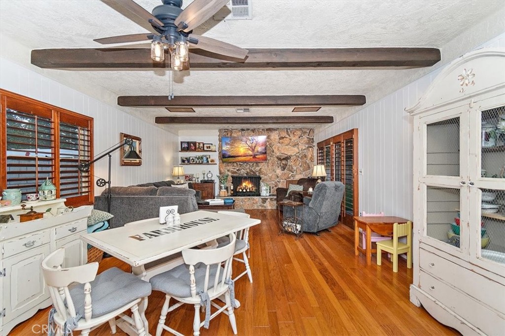 8530 Harmony Lane Riverside, CA 92504 - Photo 14 of 40 a view of a dining room with furniture window and wooden floor