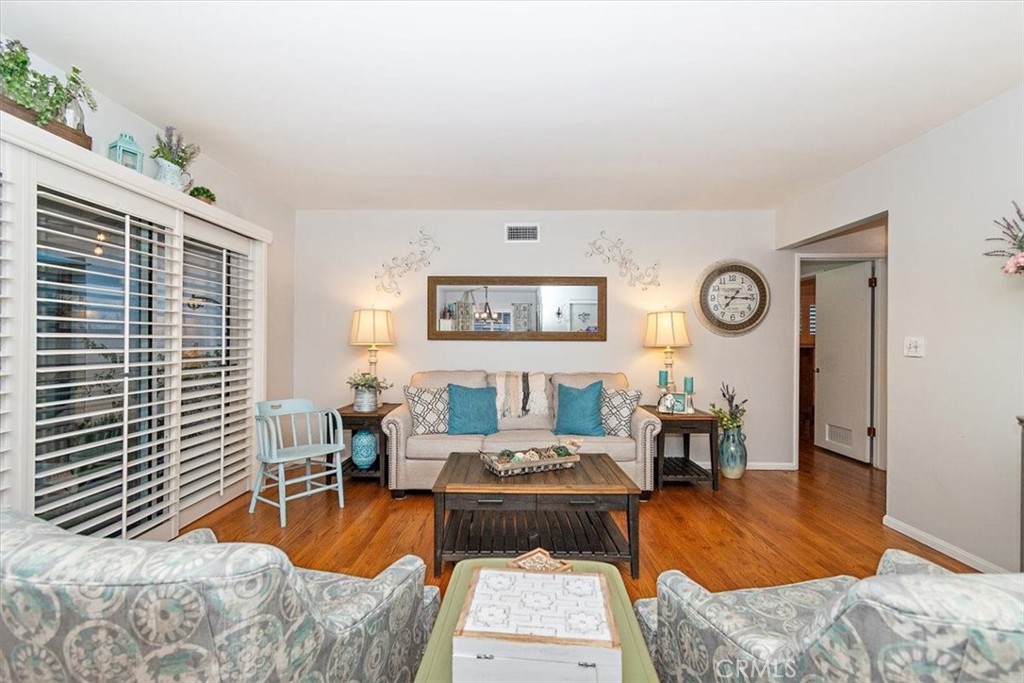 8530 Harmony Lane Riverside, CA 92504 - Photo 19 of 40 a living room with furniture and a window