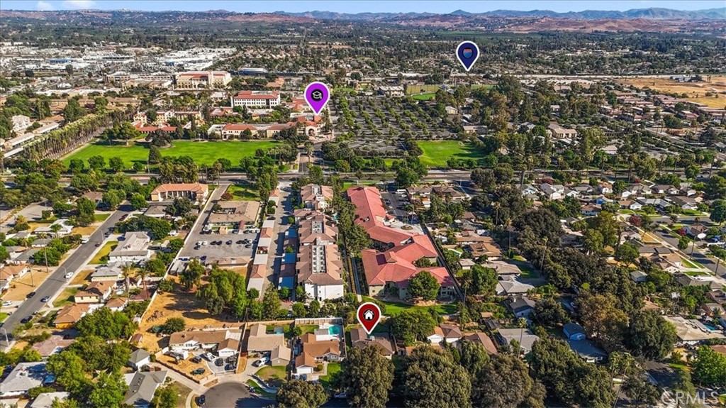 8530 Harmony Lane Riverside, CA 92504 - Photo 38 of 40 an aerial view of residential houses with street and trees