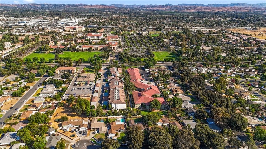8530 Harmony Lane Riverside, CA 92504 - Photo 39 of 40 an aerial view of residential houses with city and ocean view