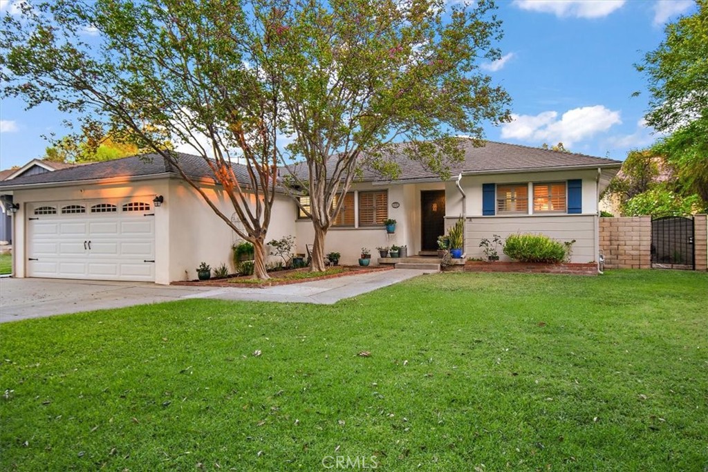 8530 Harmony Lane Riverside, CA 92504 - Photo 40 of 40 a view of a house with backyard and a tree