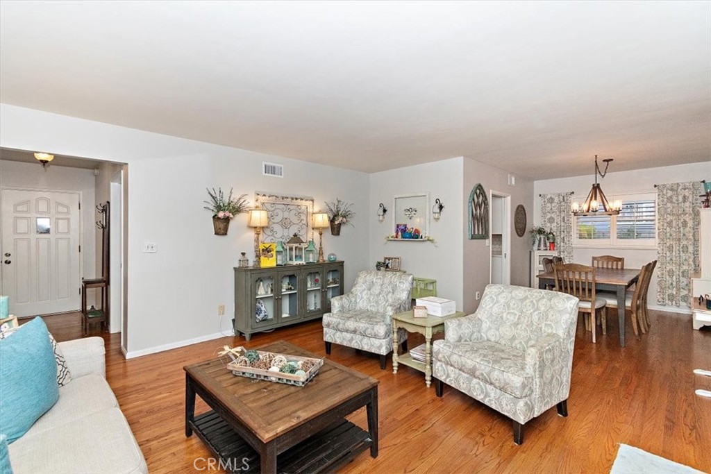 8530 Harmony Lane Riverside, CA 92504 - Photo 5 of 40 a living room with furniture and wooden floor