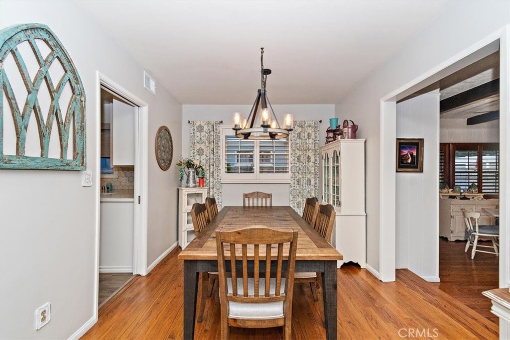 8530 Harmony Lane Riverside, CA 92504 - Photo 6 of 40 a view of a livingroom with wooden furniture and windows