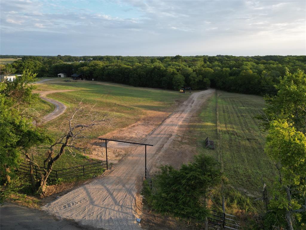 Lot 2 County Road 534 Whitewright, TX 75491 - Photo 7 of 27 a view of a swimming pool with a yard