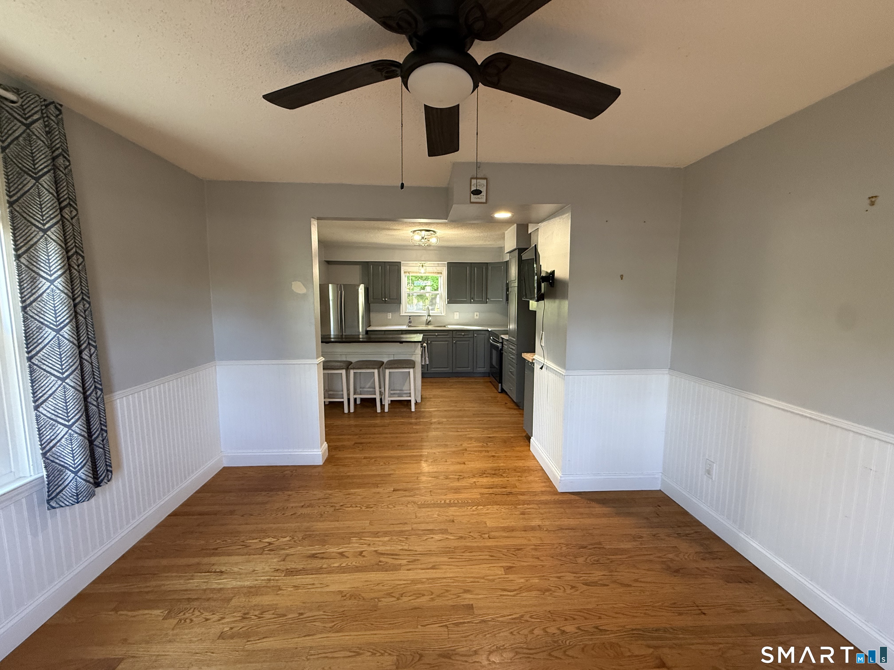 808 East Main Street Torrington, CT 06790 - Photo 20 of 40 a view of a kitchen with a sink and microwave