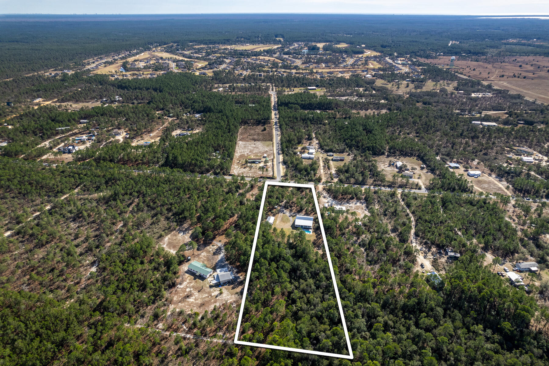 453 Don Graff Road Freeport, FL 32439 - Photo 43 of 59 an aerial view of multiple house