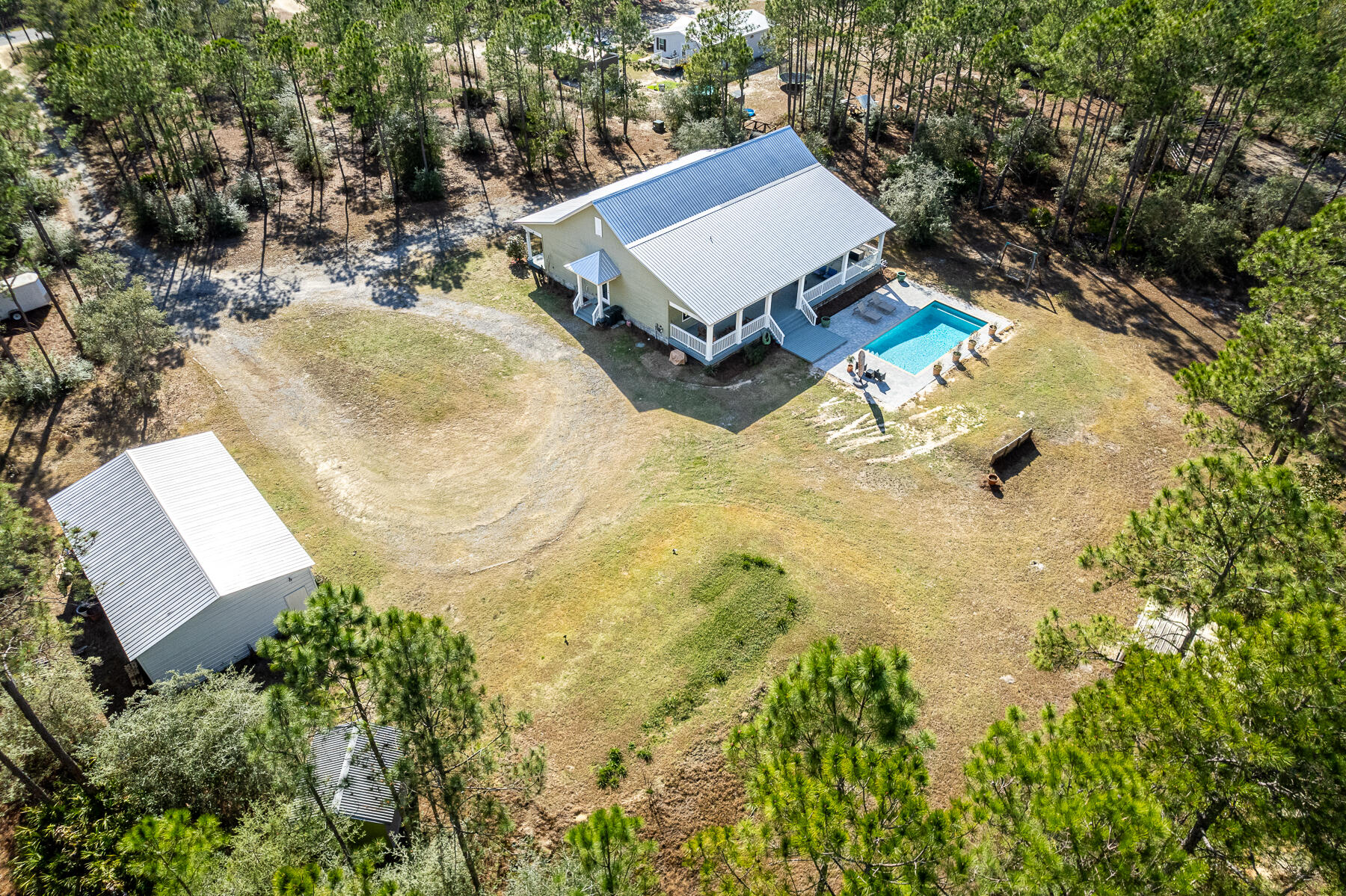 453 Don Graff Road Freeport, FL 32439 - Photo 45 of 59 an aerial view of a house with yard and swimming pool