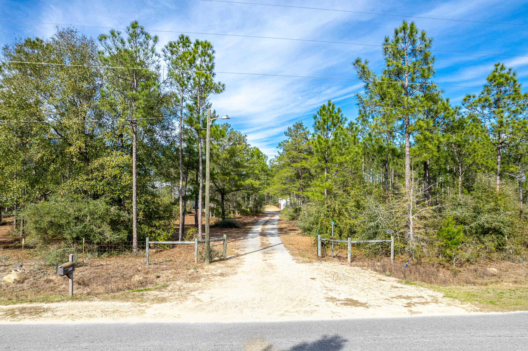 453 Don Graff Road Freeport, FL 32439 - Photo 5 of 59 a backyard of a house with lots of green space
