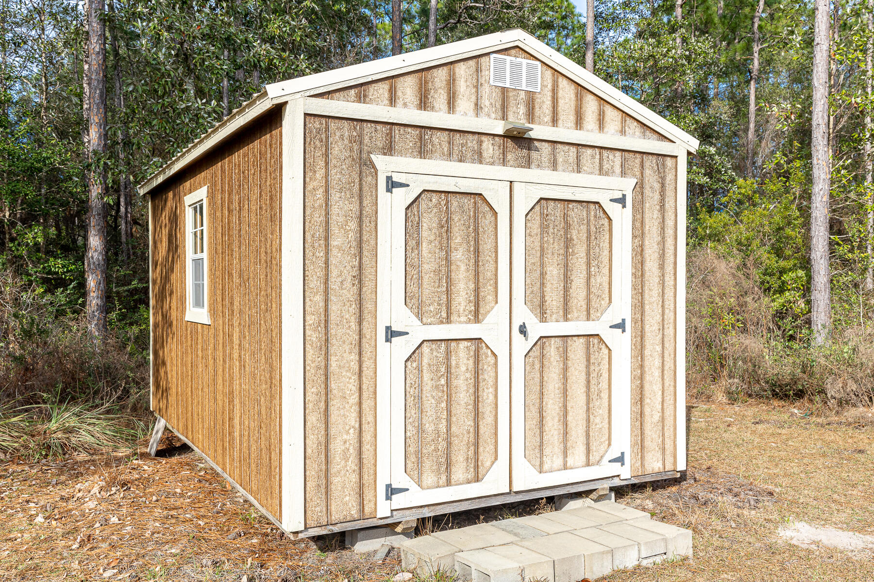 453 Don Graff Road Freeport, FL 32439 - Photo 51 of 59 a front view of a house with a yard