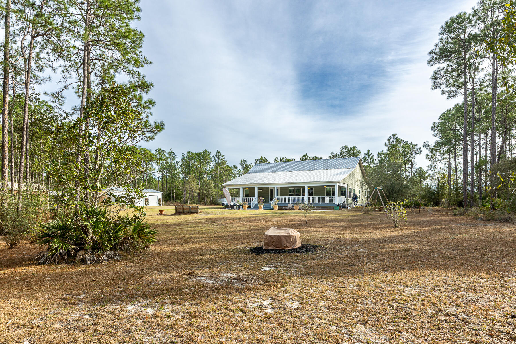 453 Don Graff Road Freeport, FL 32439 - Photo 53 of 59 a front view of a house with a yard
