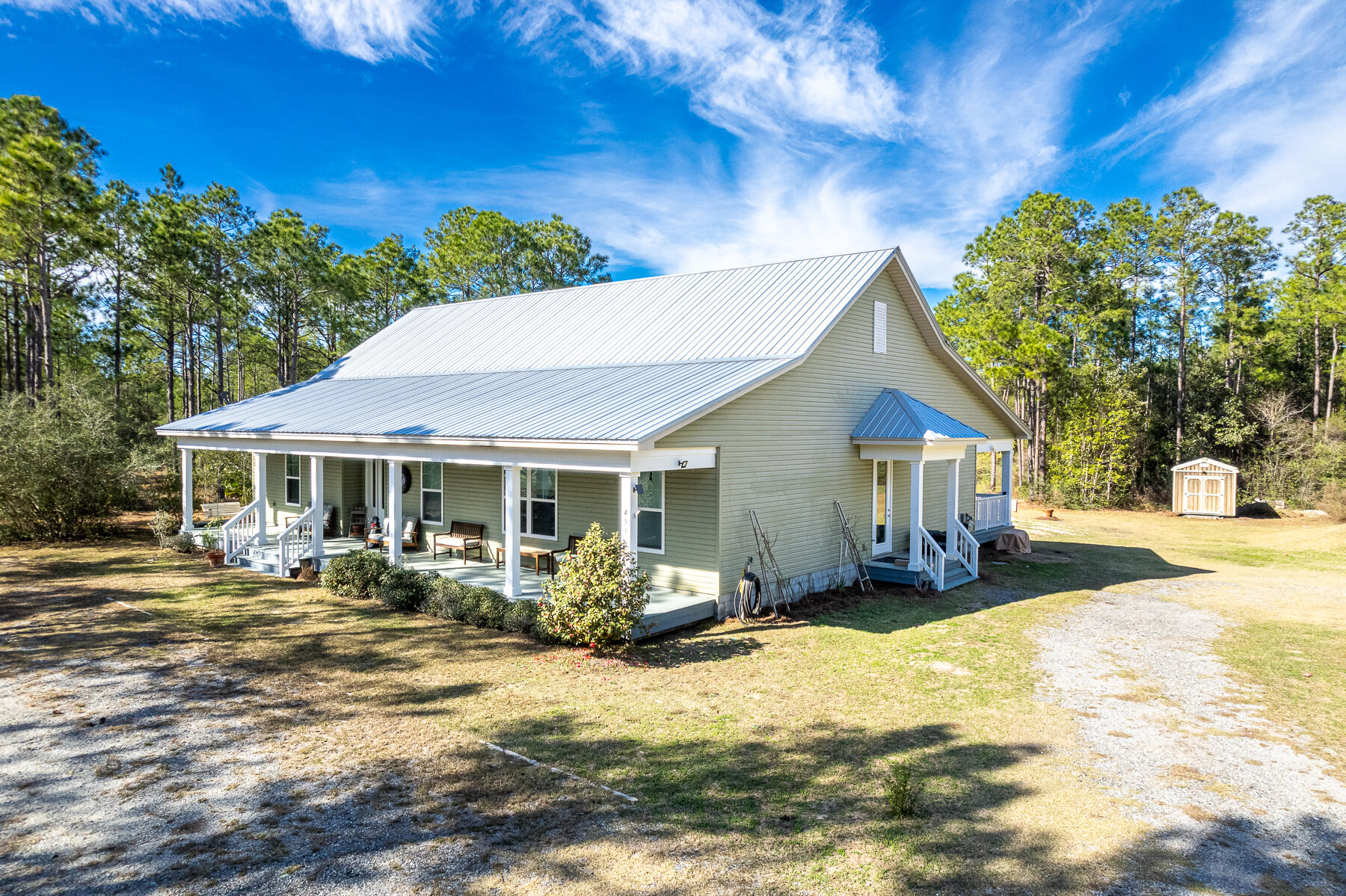 453 Don Graff Road Freeport, FL 32439 - Photo 55 of 59 a front view of a house with yard patio and livingroom view